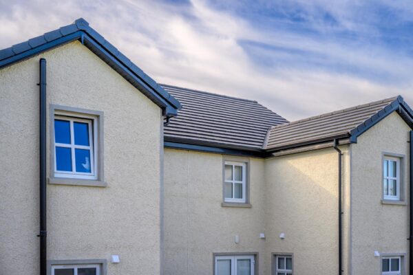 New residential development with private gardens and ornate gates