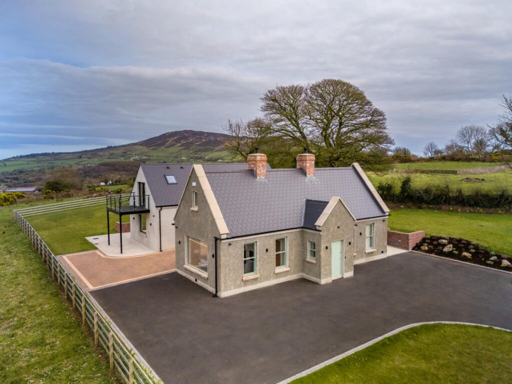 Private dwelling Aghmakane with cottage-style front and modern rear