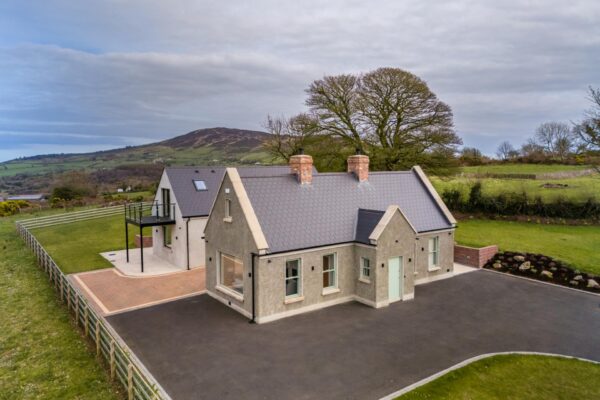 Private dwelling Aghmakane with cottage-style front and modern rear
